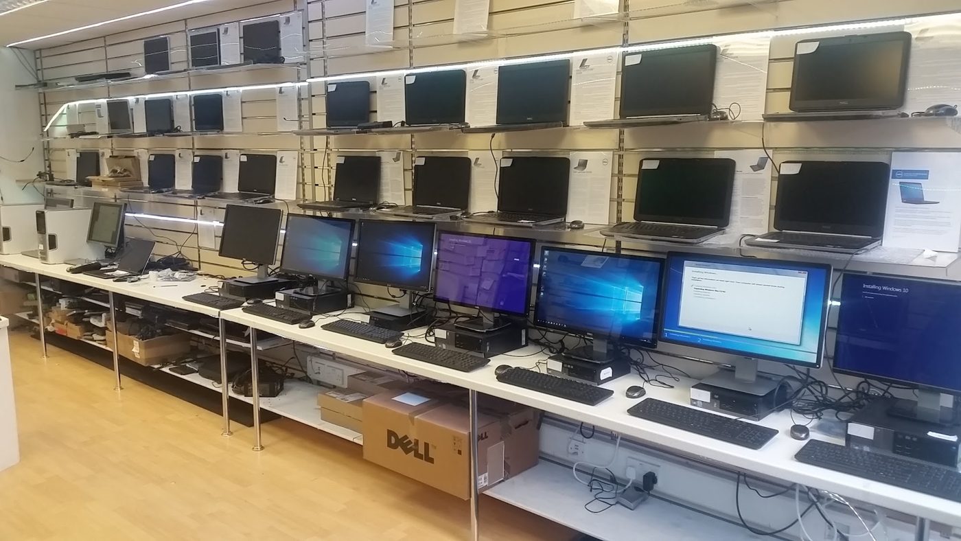 Inside our computer sales and service centre in Moordown, Winton &mdash; the wall of Dell laptops and the bench of PCs