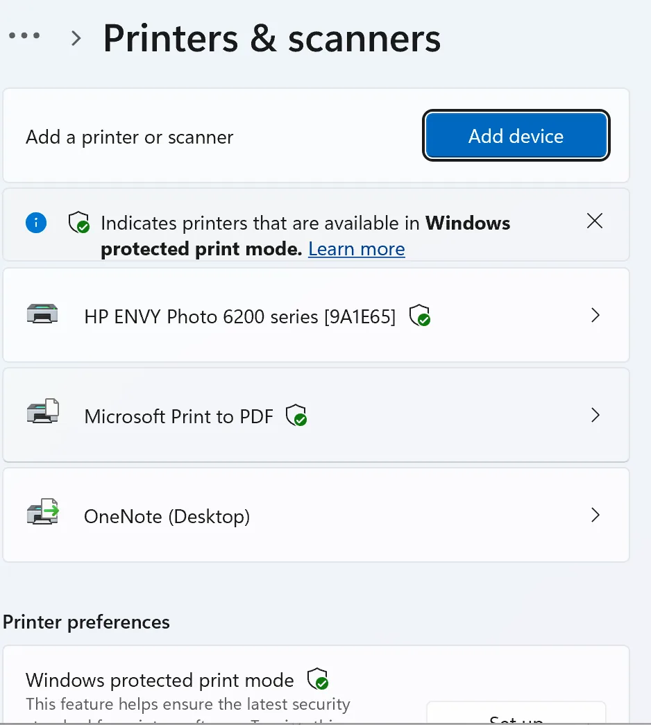 Windows 11 Settings, Printers and scanners: the Add device button above the list of installed printers