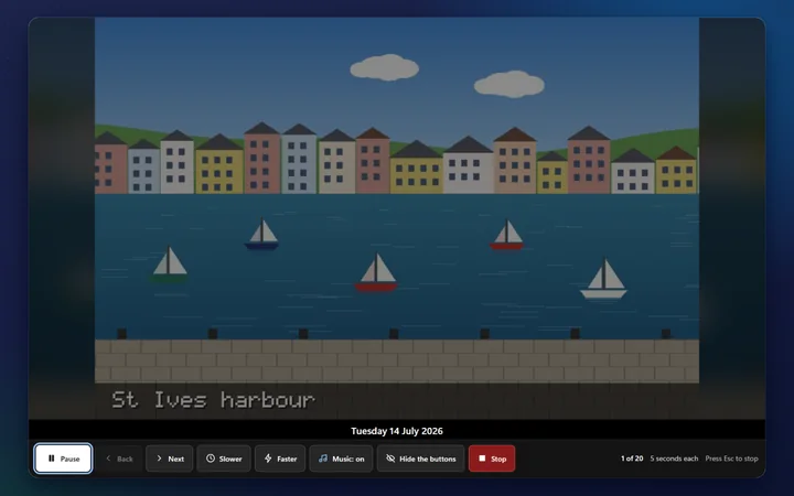 A slideshow in Albums: a photo of St Ives harbour with its date, and Pause, Back, Next, Slower, Faster, Music and Stop buttons along the bottom (a made-up sample)